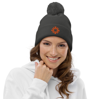 "Winter Olympics" orange embroidered pom pom beanie